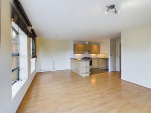 Open plan living towards kitchen - click for photo gallery